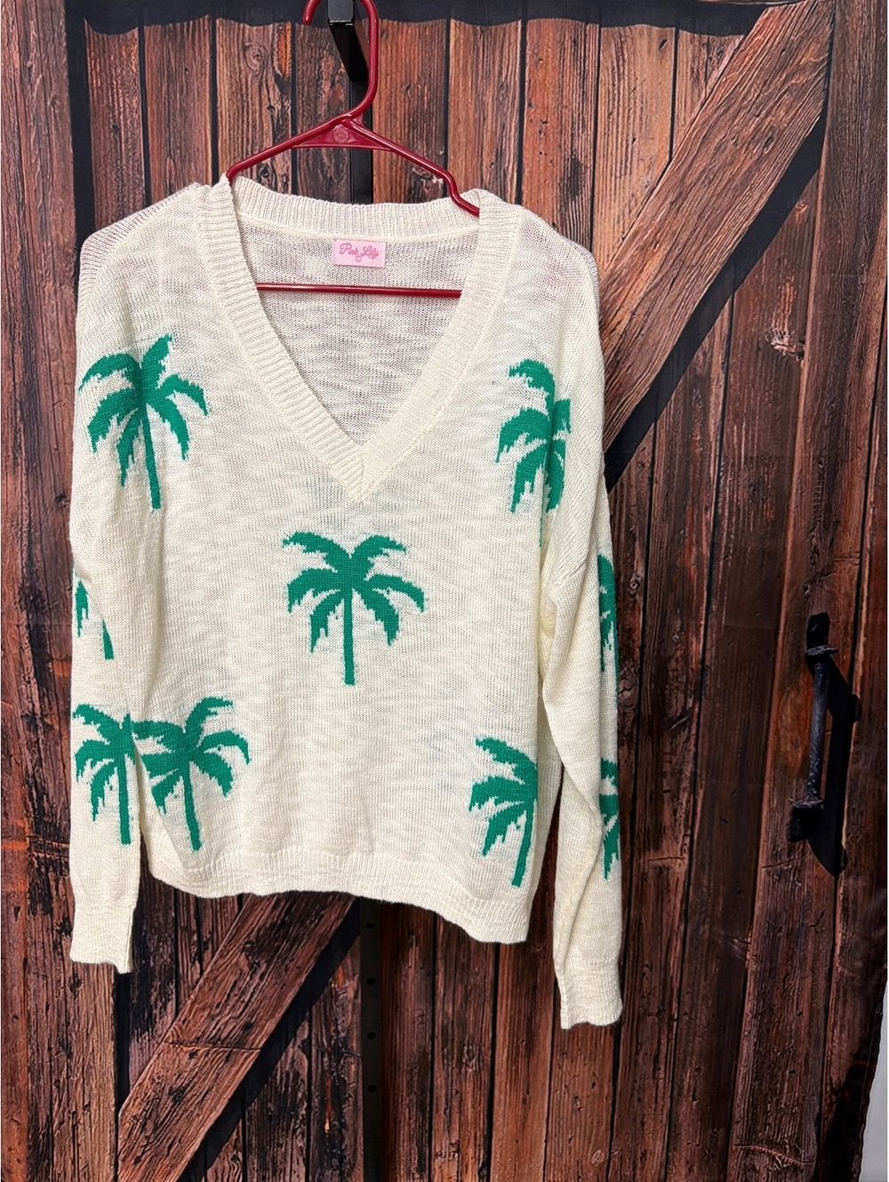 Pink Lily Cream V-Neck Sweater with Green Palm Tree Pattern